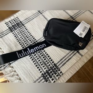 Lululemon Everywhere black word mark belt bag